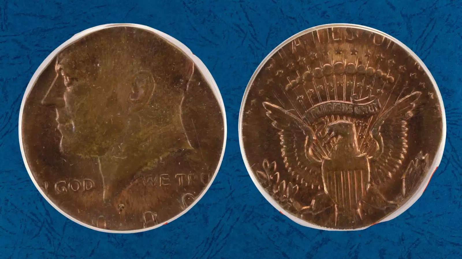 1980-P Kennedy half dollar struck on wrong cent planchet showing copper color and reduced size